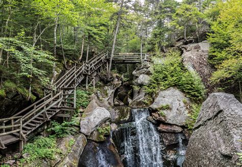 Lost river gorge and boulder caves - Climb 1,000 stairs along the mile-long boardwalk that meanders along and above the Lost River in Kinsman Notch at Lost River Gorge and Boulder Caves in the W... 